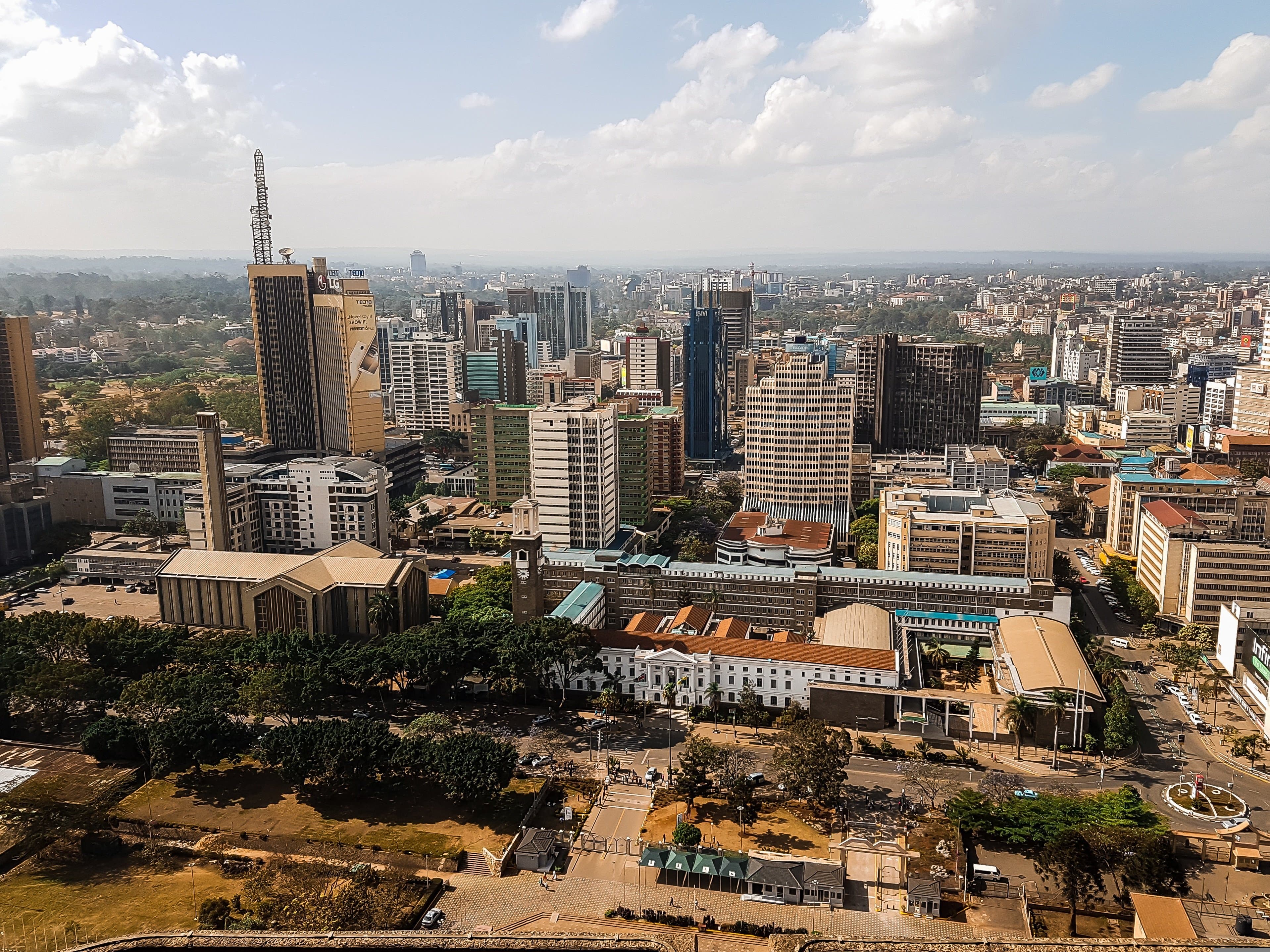 An African city skyline, representing the scale of the continent's infrastructure and investment opportunity